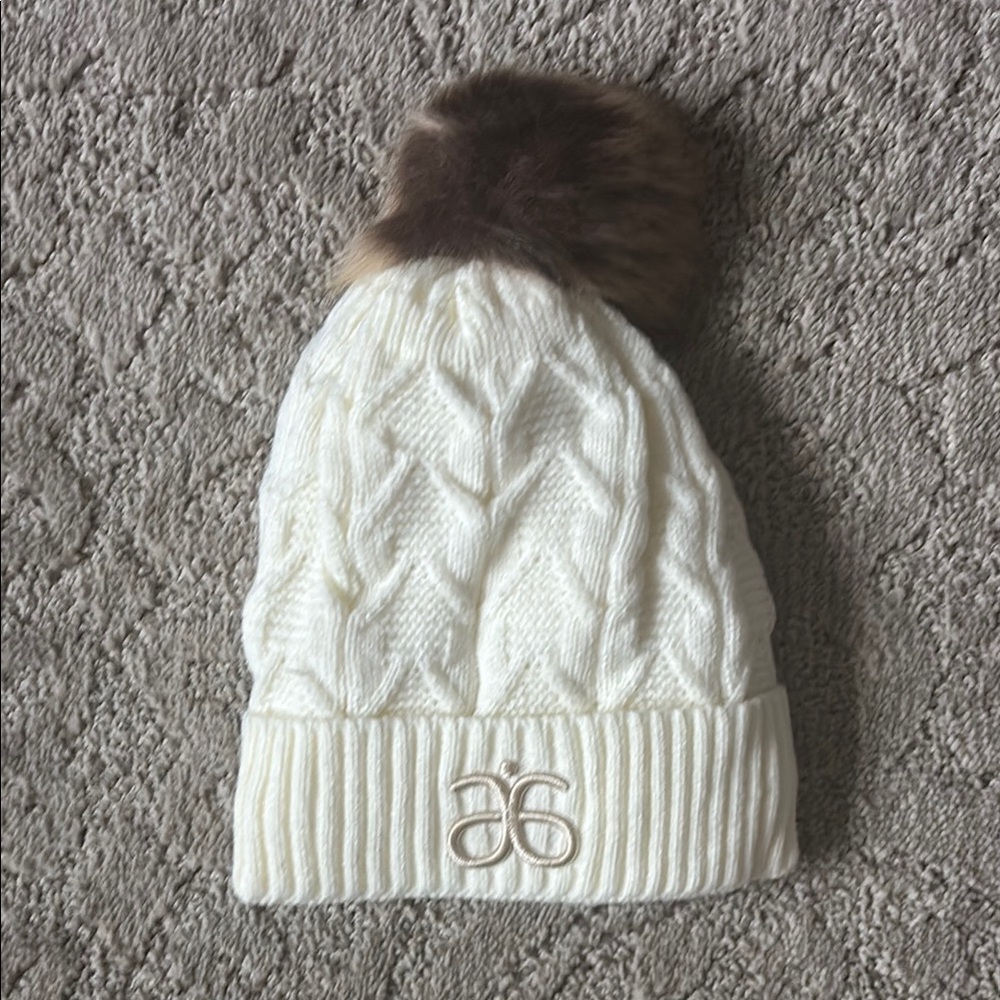 Arbonne Winter Knit Hat Cream with Brown Pom Pom NWOT, never worn
